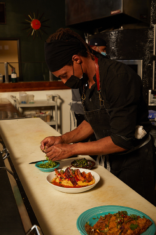 Chef John Cleveland in the kitchen_credit Travis McCoy Photography.jpg