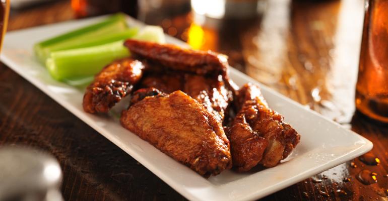Chicken wings soar on menus