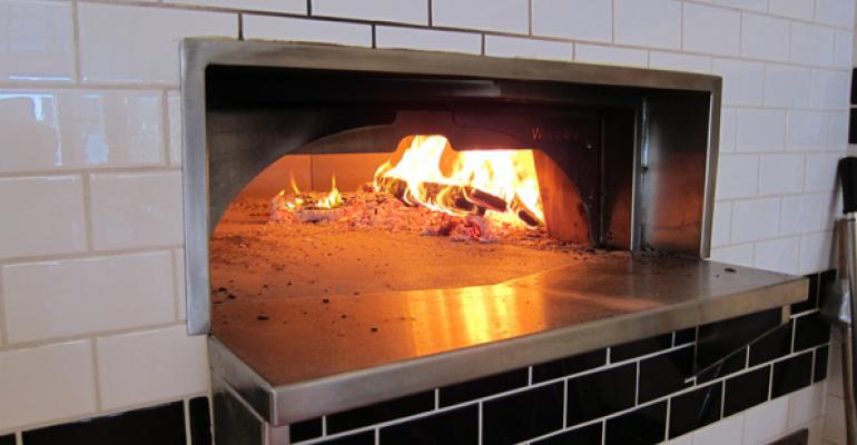 Pizzas cook in one minute in 800 Degrees39 stonehearth oven