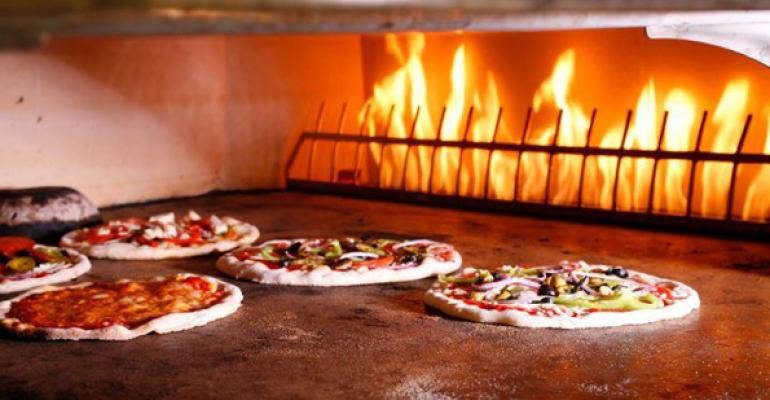 Your Pie39s pizzas cook in three minutes in a stonehearth oven
