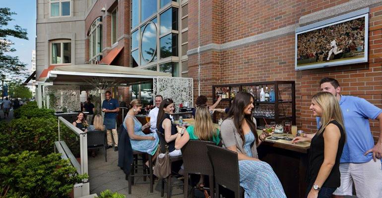Tamo Bistro amp Bar features some of the key elements of patio design including a rich landscaping a variety of seating types entertainment and adequate shade via generously sized canopies
