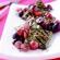 Toma Cheese Wrapped in Grilled Grape Leaves with Red Grapes